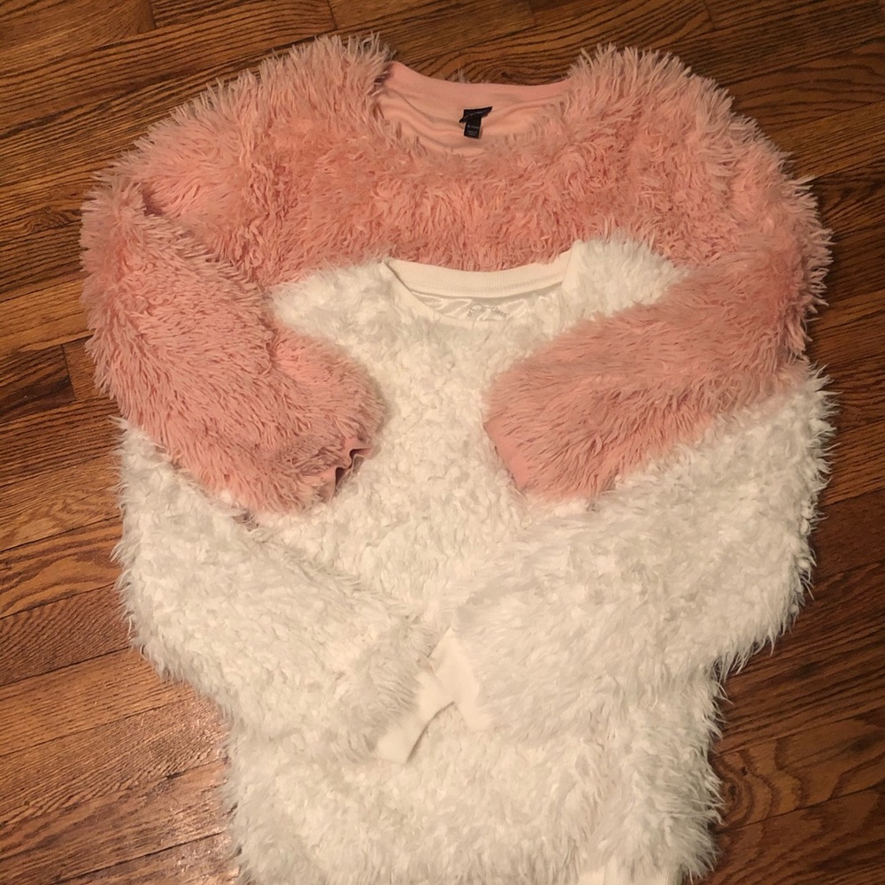 2 girls fluffy sweaters